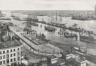 0954079 Blick vom Stintfang ber die Strassen Hafentor und Johannisbollwerk zum Hamburger Niederhafen ca. 1905. Auf der Kaianlage im Vordergrund ist eine eingezunte Areal zu erkennen, das wohl fr Vieh oder Pferde bestimmt ist. Auf der Elbe liegen Segelschiffe mit gerafften Segeln sowie auch einige Dampfschiffe. Links im Hintergrund der Kaiserspeicher.  Sie mchten diese historische Motiv z.B. auf Fotoleinwand erwerben? www.hamburg-bilder.biz